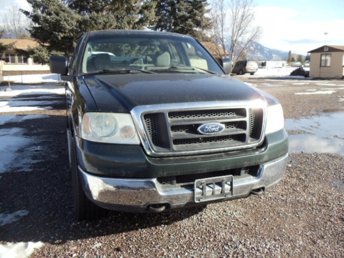 2004 Green /Gray Ford F-150 XL (1FTVX14504N) with an V8, 5.4L; SOHC engine, Automatic transmission, located at 5465 Highway 2 W., Columbia Falls, MT, 59912, (406) 892-4407, 48.352188, -114.240929 - Cruise control AC Tilt Wheel Towing - Photo#1